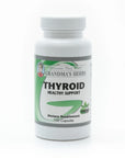 Herbal thyroid supplement from Grandma's Herbs, featuring natural ingredients in a clear container with herbal labels.